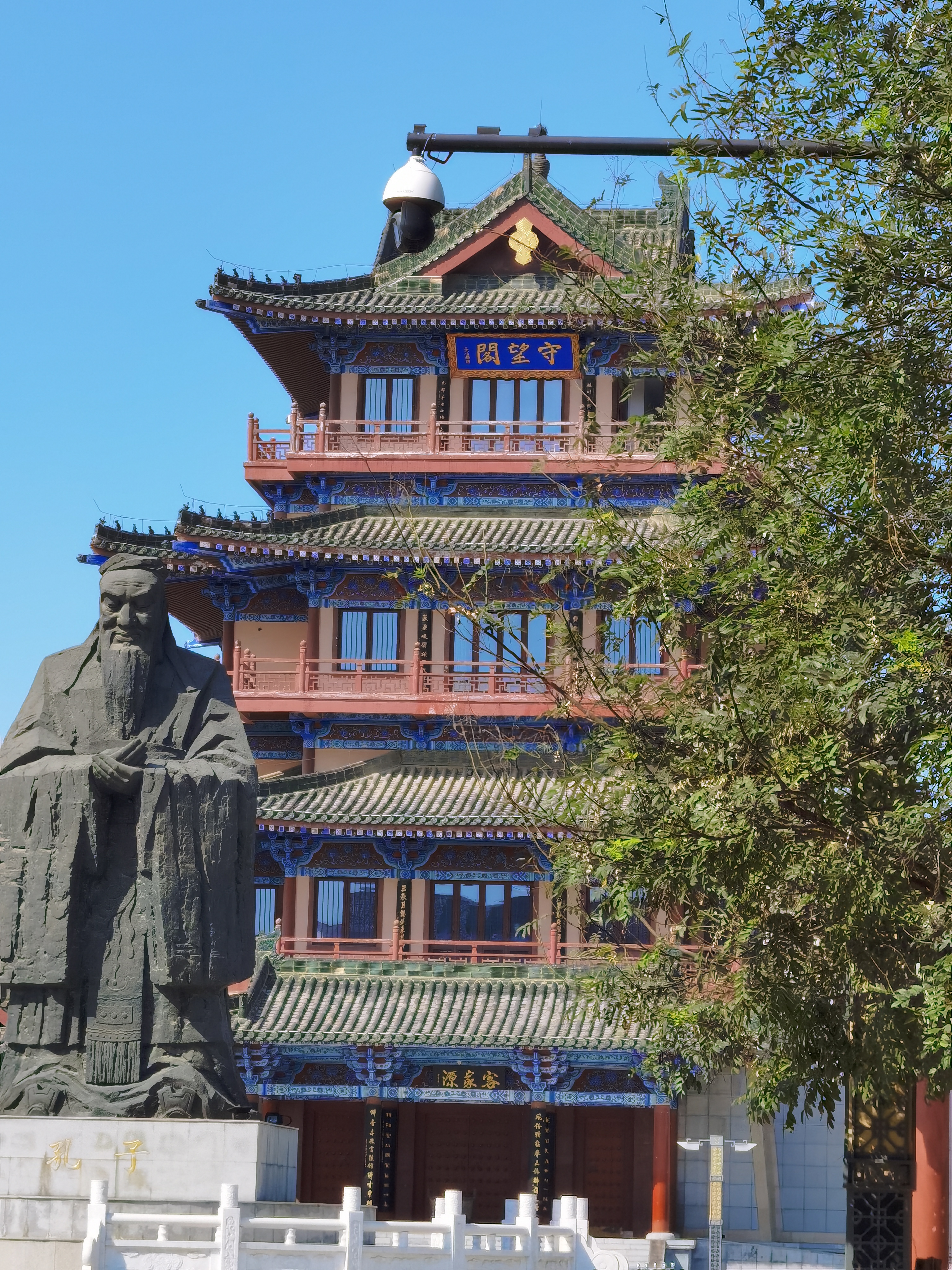 Statue in front of historical building